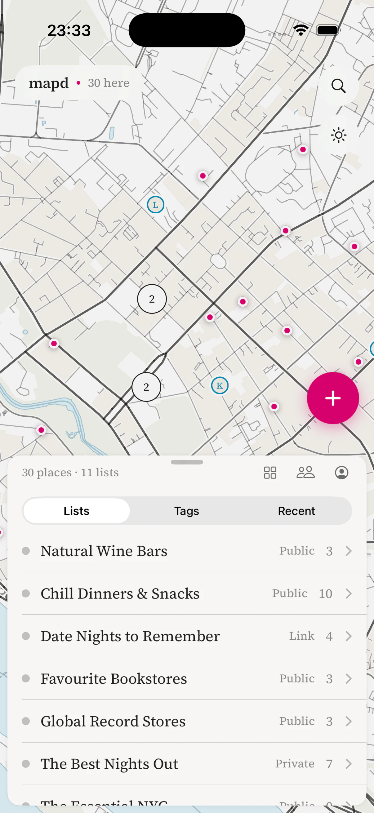 The mapd map home screen: saved places across Rīga as magenta pins, with a sheet listing Natural Wine Bars, Chill Dinners & Snacks and Favourite Bookstores.